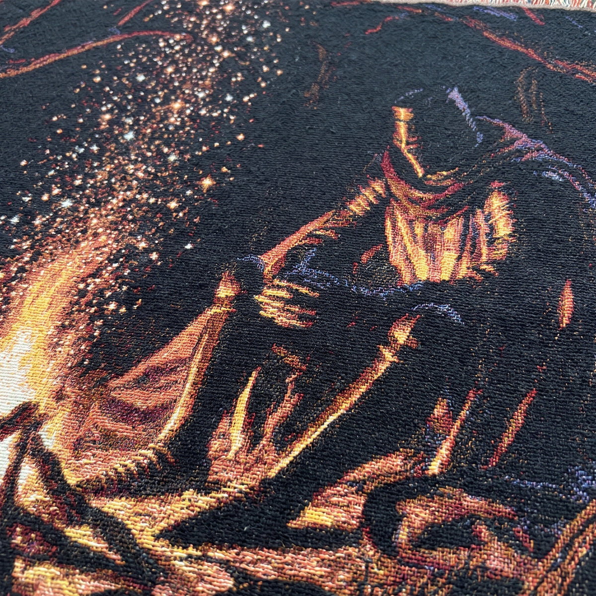 Close-up view of Knight's Vigil woven blanket and knight artwork